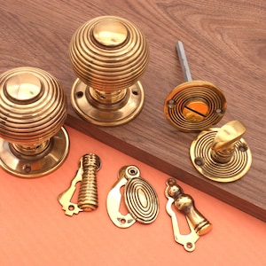 Reeded Beehive Rim Mortice door knob 60MM with Escutcheons / privacy Aged Brass