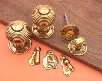 Reeded Beehive Rim Mortice door knob 60MM with Escutcheons / privacy Aged Brass