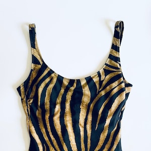 Gucci tiger swimsuit shop