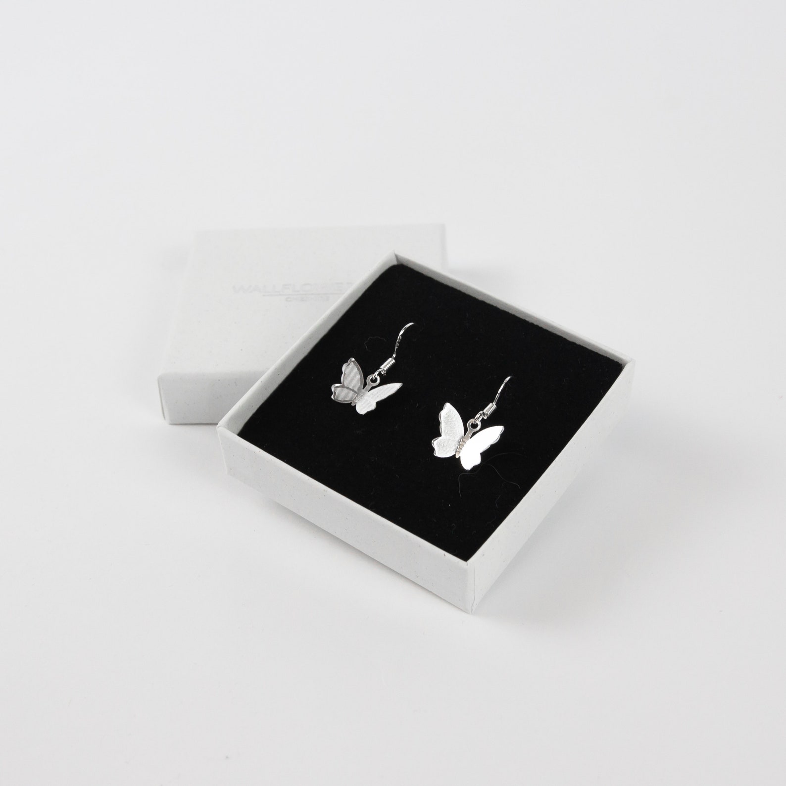 Triple Butterfly Drop Earrings main image 1