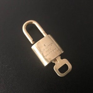 Authentic Louis Vuitton Gold Brass Lock and Key Set 319 -  Australia