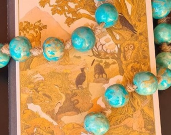 Suspension boules d'argile bleu turquoise sur corde de jute fait main