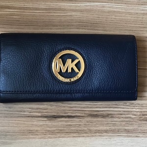Michael Kors wallet in camel-colored leather