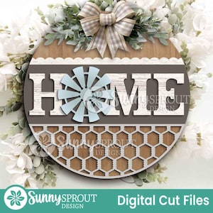 May include: Round wooden sign with the word "HOME" in white letters, a light blue windmill, and a honeycomb pattern. The sign is decorated with a bow and greenery. The text "Sunny Sprout Design" and "Digital Cut Files" are also visible.