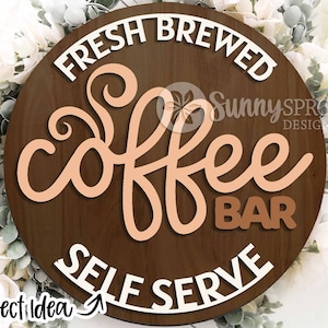May include: A round wooden sign with the text "Fresh Brewed Coffee Bar Self Serve" in white lettering. The word "coffee" is in a large, stylized font in peach.