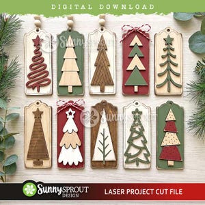 May include: Ten rectangular wooden Christmas tree ornaments with varied designs, including layered wood, painted green, red, and white finishes, and decorative twine bows. These laser-cut tags feature star toppers and geometric tree shapes.