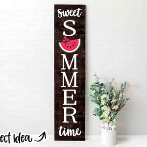 May include: A wooden sign with the words "Sweet Summer Time" in white letters. The "S" is decorated with a red watermelon slice. The sign is perfect for summer decor.