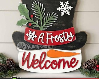 Een winterse welkomstdecoratie met sneeuwpopmuts, deurhanger SVG-bestand voor lasersnijden, winterse welkomstdecoratie SVG, kerstdecoratie
