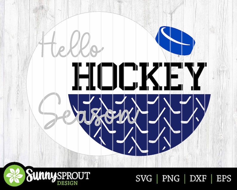 May include: A white circle with the text "Hello Hockey Season" in black and gray lettering. The circle is half filled with a blue and white hockey stick pattern.