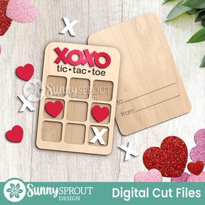 May include: A wooden tic-tac-toe game with red hearts and white X's. The game board has the text "XOXO tic tac toe" and the Sunny Sprout Design logo. A blank wooden card is next to the game board. Scattered around are red and pink glitter hearts.