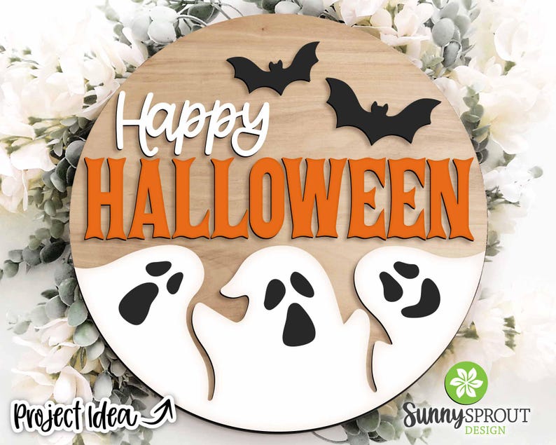 May include: A round wooden sign with the words "Happy Halloween" in orange letters. There are three black bats and three white ghosts with black eyes on the sign.