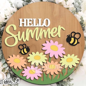 May include: A round wooden sign with the words "HELLO Summer" in white and light green. The sign features colorful flowers, green grass, and two black and yellow bees. The words "Project Idea" are in the lower left corner.