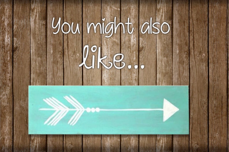 May include: A turquoise wooden sign with a white arrow design. The sign says "You might also like..."