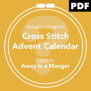 May include: A yellow background with a white embroidery hoop. The text inside the hoop reads "@thathowtogirl's Cross Stitch Advent Calendar DESIGN: Away in a Manger". The word "PDF" is in the top right corner.