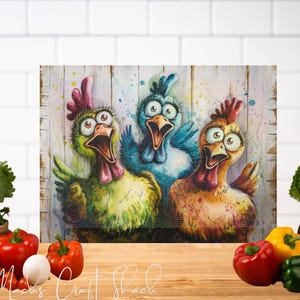 May include: Three colorful cartoon chickens with exaggerated features, including large eyes and open beaks, are depicted on a white wooden background. The chickens are painted in shades of blue, green, and orange.