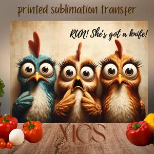 May include: Printed sublimation transfer featuring three cartoon chickens with exaggerated expressions. The text "RUN! She's got a knife!" is displayed above the chickens. The image is set against a neutral background with vegetables in the foreground.