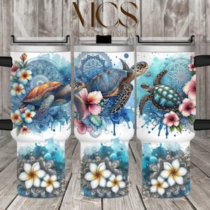 May include: A white stainless steel tumbler with a black handle and lid. The tumbler features a watercolor design of sea turtles and tropical flowers. The text "Macks Craft Shack" is printed on the tumbler.