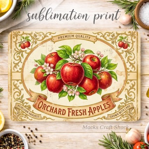 May include: Rectangular sublimation print featuring a vintage design with a central oval showcasing red apples, green leaves, and white blossoms. The print includes the text "ORCHARD FRESH APPLES" and "HEIRLOOM HARVEST". The background is a light beige with decorative borders.
