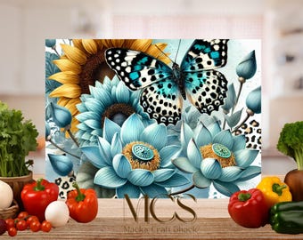 May include: A vibrant floral print featuring a large butterfly with turquoise and black wings, set against sunflowers and blue lotus flowers. The artwork includes the text "MACKS CRAFT SHACK" and "MCS".