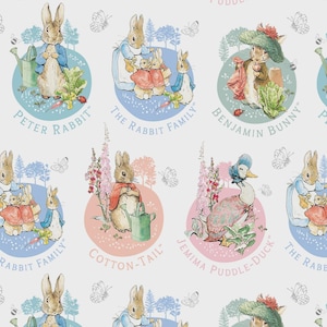 May include: A repeating pattern fabric featuring watercolor illustrations of Peter Rabbit, The Rabbit Family, Benjamin Bunny, Cotton-Tail, and Jemima Puddle-Duck. Each character is enclosed in a circular frame with text labels on a light background.
