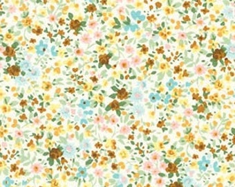 May include: A white fabric with a small floral pattern. The flowers are in shades of yellow, pink, blue, and brown.