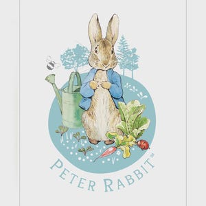 May include: A watercolor illustration of Peter Rabbit wearing a blue jacket, standing in a garden with a green watering can, leafy vegetables, a ladybug, and a bee. The text Peter Rabbit is printed in blue at the bottom of the circular design.