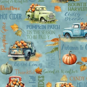 May include: A teal fabric design featuring vintage trucks filled with pumpkins, autumn leaves, and text like "Pumpkin Patch" and "Sweater Weather." The design evokes a fall harvest theme.