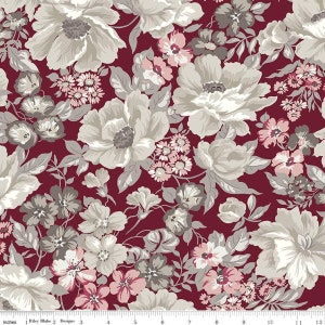 May include: A burgundy fabric with a floral pattern featuring white, gray, and pink flowers. The fabric has a repeating pattern of large and small flowers.