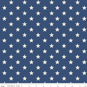 May include: A navy blue fabric with a white star pattern. The fabric is 12 inches wide and is ideal for quilting, crafts, and home decor projects.