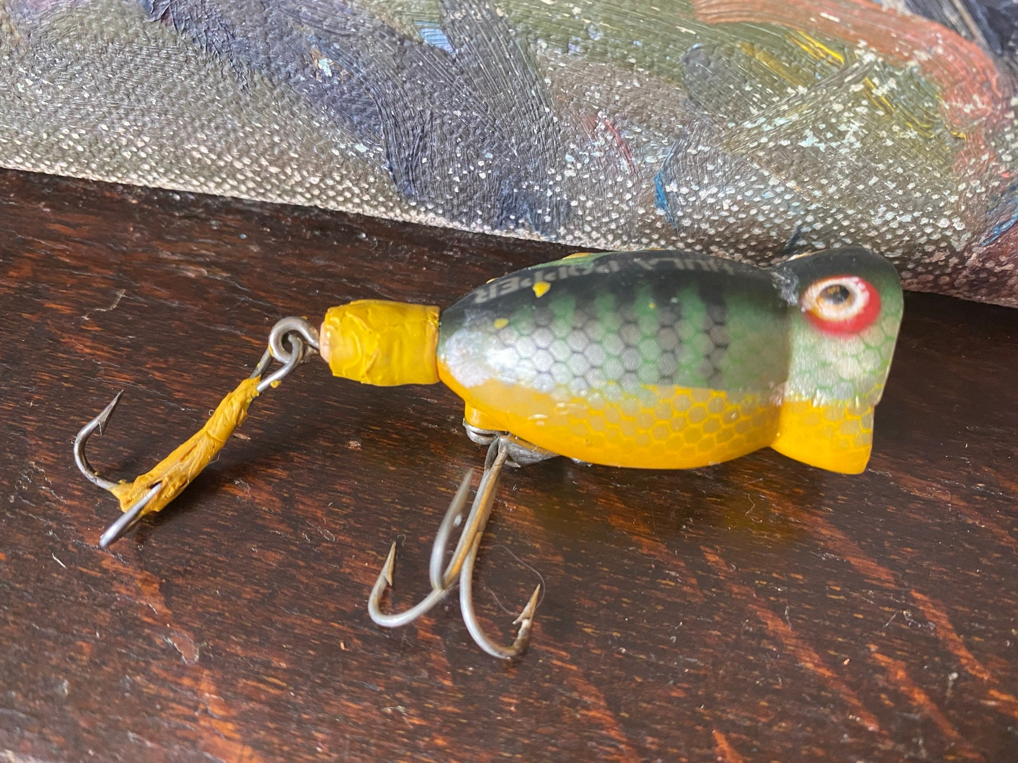 Five Vintage Fishing Lures, 3 7/8 Bass Lure, 4 7/8 Flowering Floreo In  Original Container, Original Rapala Wobbler Finish, Original Box 4 3/8, 2  Shaker With Tail, Hula Popper 2 1/4, Good