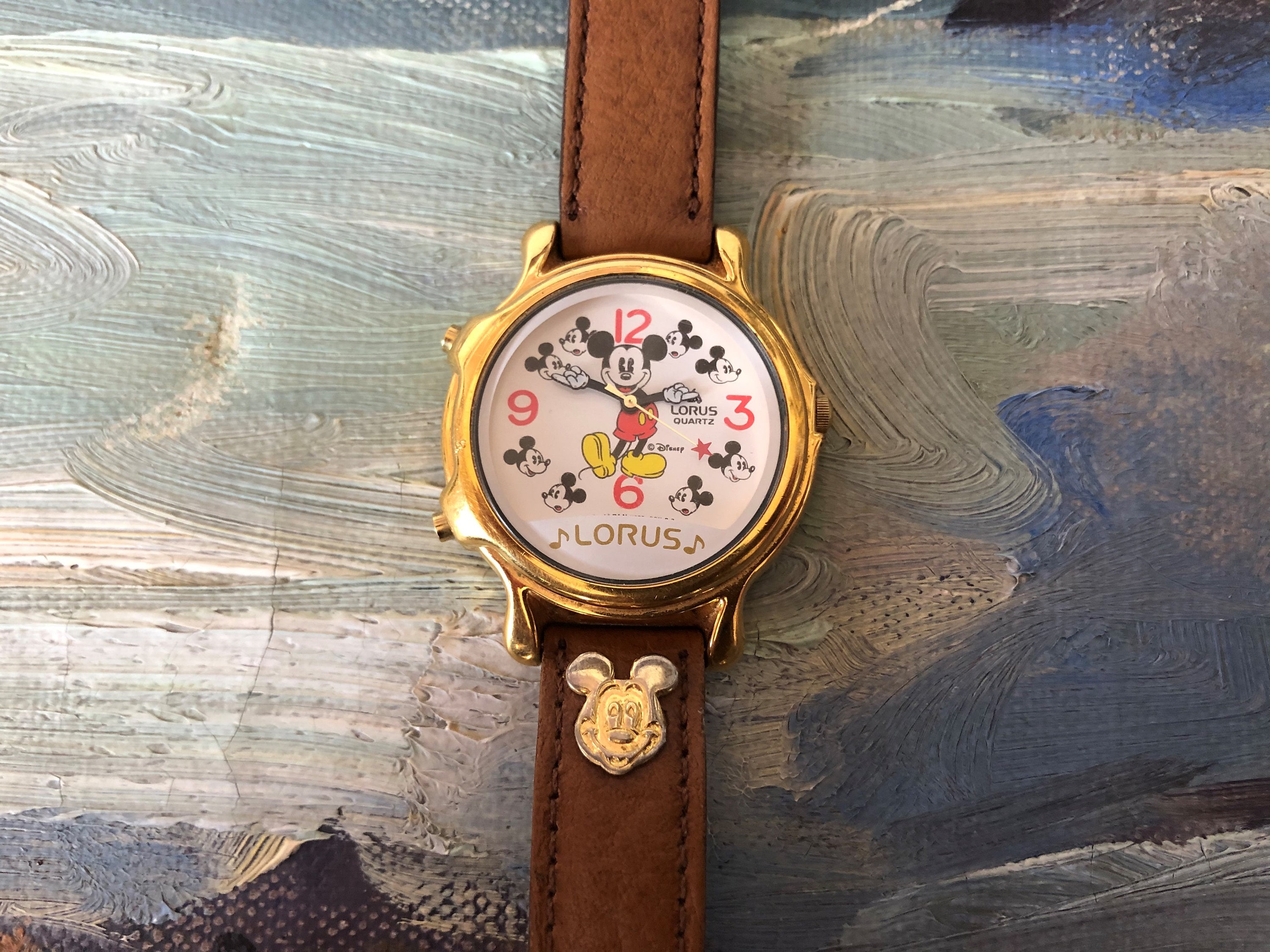 Mickey mouse musical watch it's small world hotsell