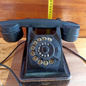 Vintage desk phone made in the USSR. Retro phone. Historical artifact. Antique gift. Army souvenir.