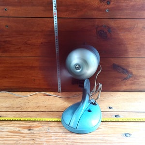 Vintage desktop electric fan from the middle of the 20th century fro m the USSR.Antique gift. Electric fans from the past. Electric fan.