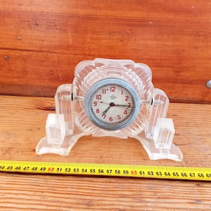 Vintage mechanical table (tank) clock of the &quot;Chelyabinsk watch factory &quot;in plastic decor. Clock from the USSR, mid-20th century.