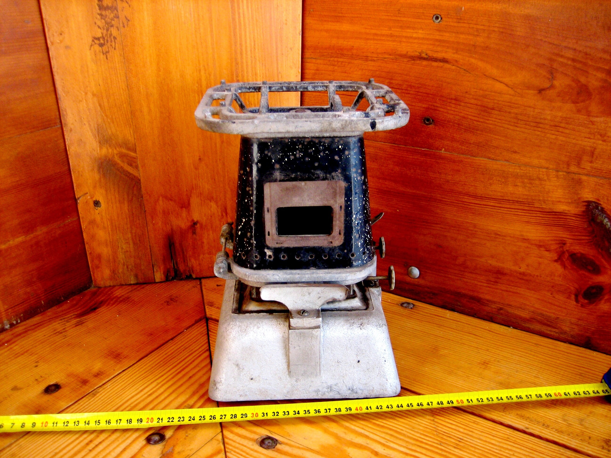 An ancient kerosene stove (Kerogaz) for two burners for cooking on an open fire, a sample of the