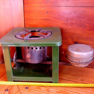 Old kerosene stove (Kerogaz), for cooking on an open fire, sample of the 30-40s of the twentieth century. Historical artifact. Antique gift.