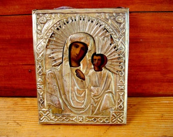 An old Russian Orthodox icon of the Kazan Mother of God, 19th century, in a bronze setting. Orthodox Russian icon of the Virgin.