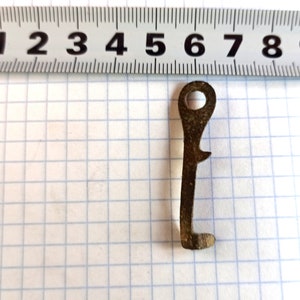 The ancient medieval amulet-talisman of the home family hearth - &quot;Key&quot;. Historical artifact. Magic bronze talisman.