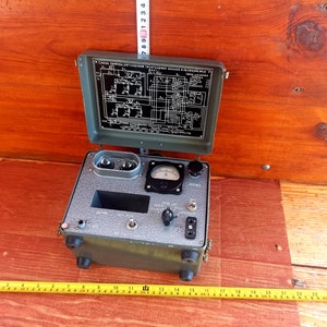 Vintage army device for adjusting telegraph channels and testing relays. Measuring device for the needs of the Soviet Army, 1965