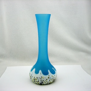 Antique designer vase. Frosted glass vase with an unusual author&#39;s design. Old vintage vases.