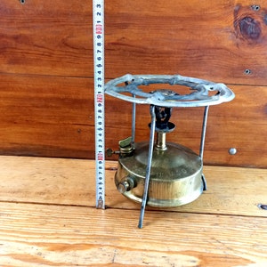 Old bronze kerosene stove for cooking on an open fire, Primus - &quot;Record&quot;. Historical artifact. Antique gift.