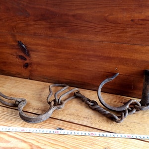 Antique forged shackles of the 18th-19th centuries. Horse leg shackles. Prison shackles on the legs. Prison handcuffs. Handcuffs.