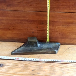 Vintage bronze inkwell from the early 20th century in Art Nouveau style. Historical artifact. Antique gift. Modern style.