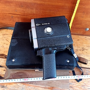 Vintage movie camera for 8 mm film - &quot;Lomo&quot;. 60s Cinematography of the USSR. Movie cameras. Antique souvenir.