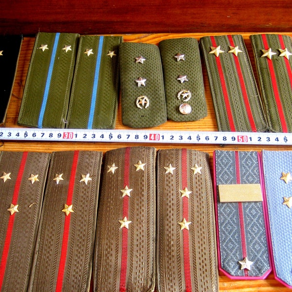 Old officer shoulder straps of the Soviet Army during the Cold War. Historical artifact. Army gift,