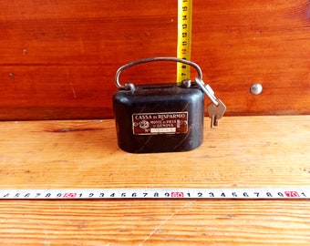 Vintage, mechanical, banking, advertising piggy bank for money, with a native key, city of Genoa (Italy). Antique gift. Historical artifact.