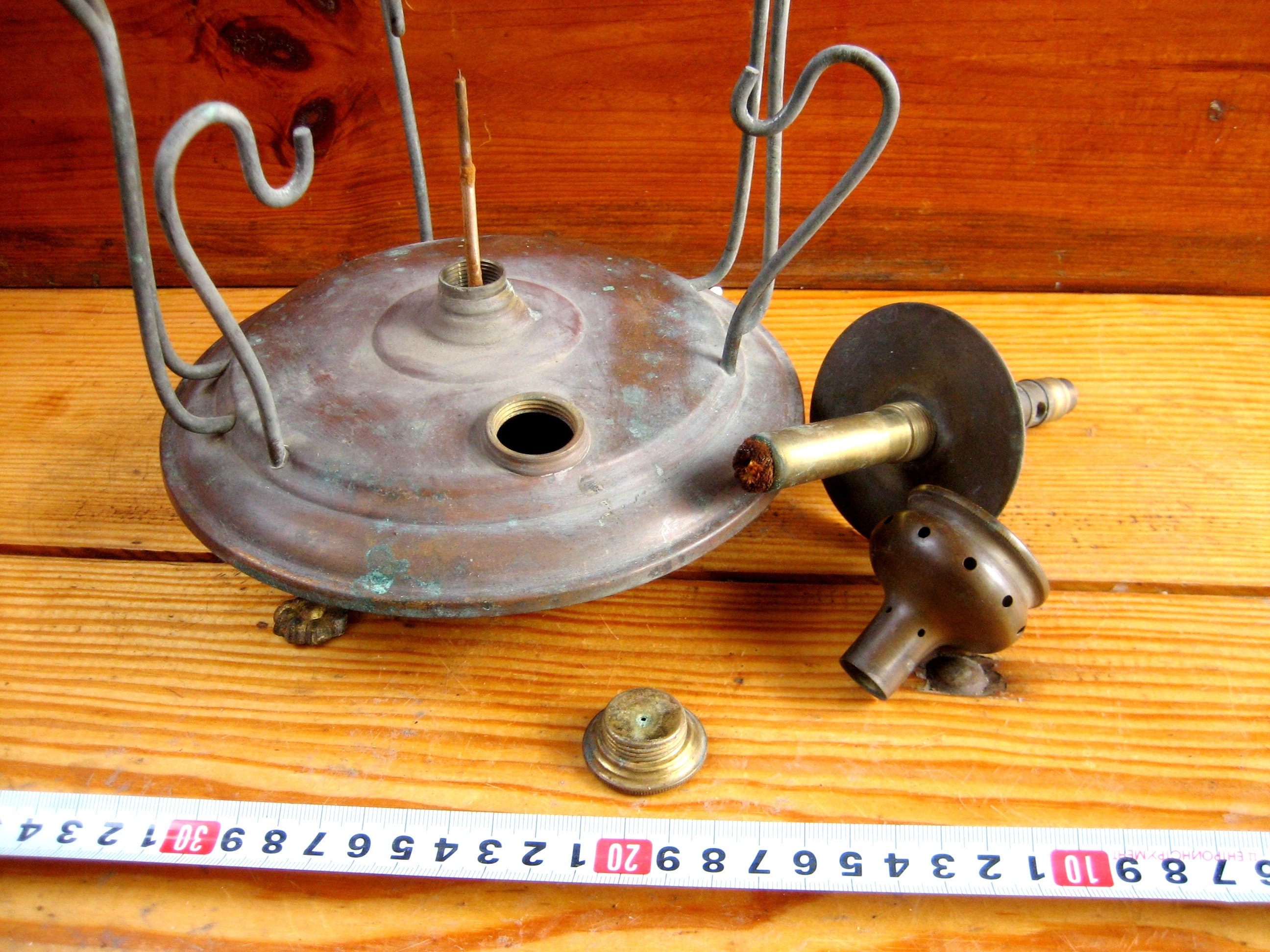 Antique bronze kerosene stove for cooking on an open fire from Etsy