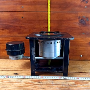 Vintage primus stove (Kerogaz) for one burner for cooking on an open fire of the 20th century. Historical artifact. Antique gift.