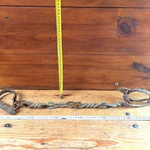 Antique forged shackles of the 18th-19th centuries. Horse leg shackles. Prison shackles on the legs. Prison handcuffs. Handcuffs.