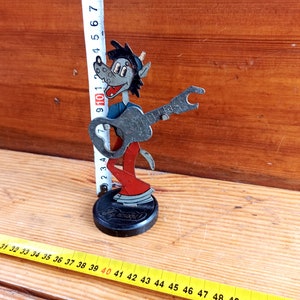 Vintage wolf figurine with bottle opener. Bottle opener. Cartoon character from the USSR. Antique gift.